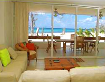 living room with pull-out sofas, beach/ocean view, stereo, satelite and TV